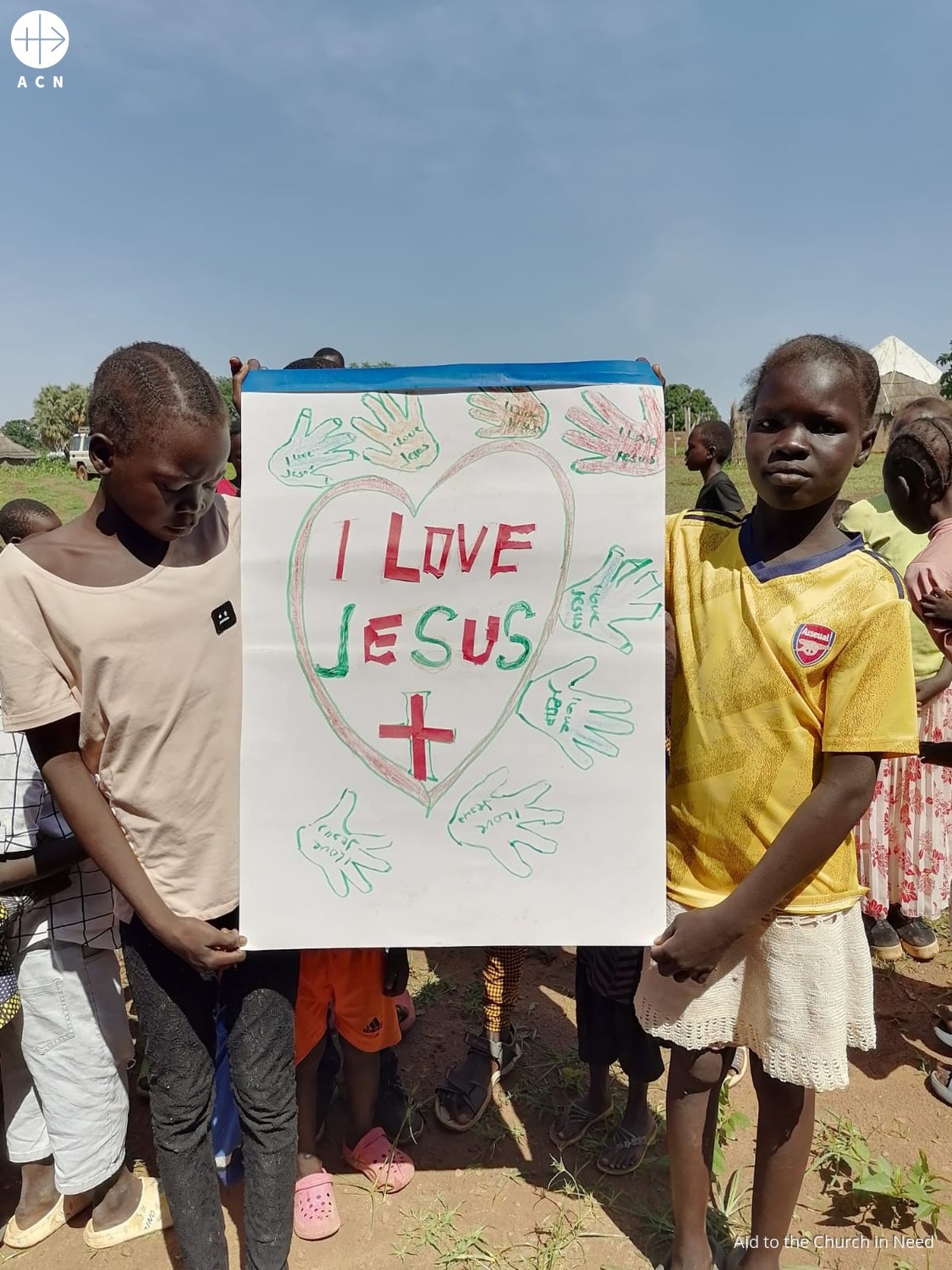 Sudán del sur niños con letrero yo amo a jesus